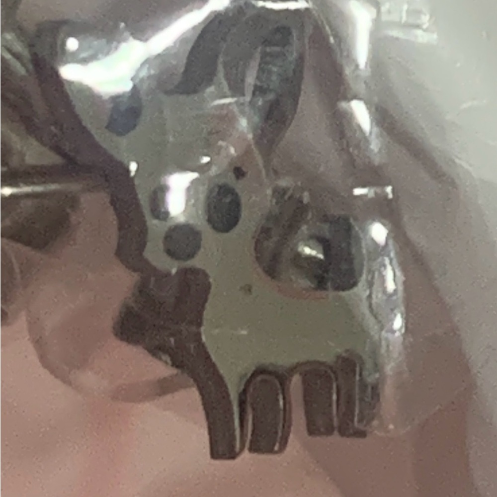 Small animal (dog?) earrings
